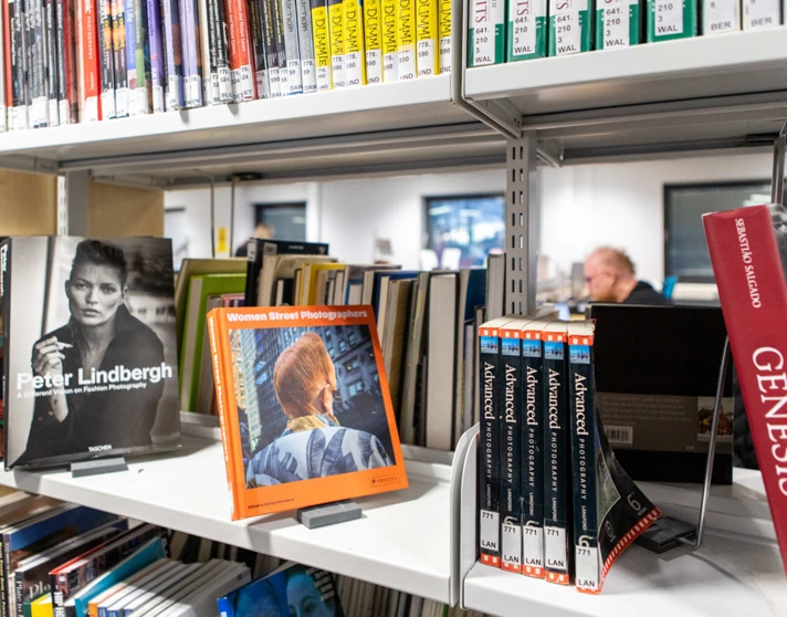 Close-up of photography books on display in the Easterhouse campus library at Glasgow Kelvin College, including titles like Peter Lindbergh and Women Street Photographers. Close-up of photography books on display in the Easterhouse campus library at Glasgow Kelvin College, including titles like Peter Lindbergh and Women Street Photographers.